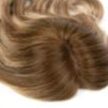Close-up of a natural-looking wig hairline